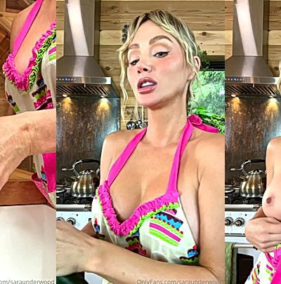 Sara Underwood is playing with a huge cucumber
