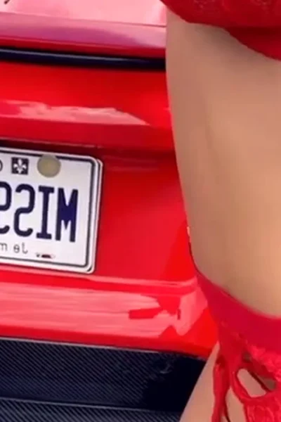 hot sexy canadian model Miss Lexa looks hot in red lingerie by her car